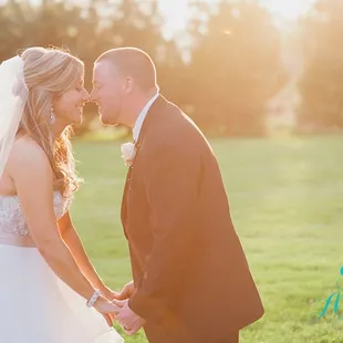 Sunset wedding portraits in the fields of Mustard Seed Gardens by Stacy Able Photography