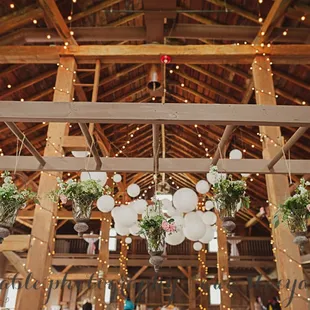 Hanging flowers inside the barn