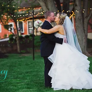 Sunset wedding portraits in the fields of Mustard Seed Gardens by Stacy Able Photography