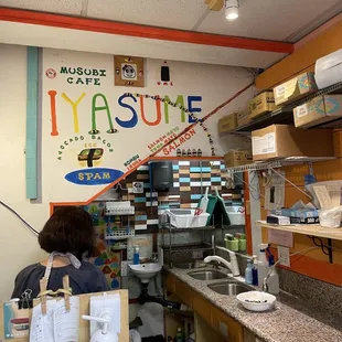 a woman in a kitchen