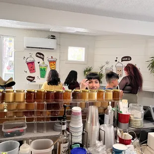 a group of people in a kitchen