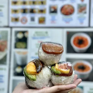 Teriyaki spam musubi, egg + eel + avocado musubi, spam + egg + bacon + avocado musubi