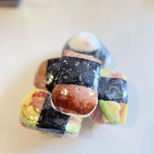 Teriyaki SPAM Musubi x2, Avocado Bacon Egg SPAM Musubi x2, and Tuna Mayo Onigiri