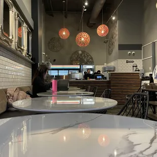 a table and chairs in a restaurant