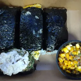 Top left to right: Teriyaki Spam, Spam &amp; Egg, and Spicy Sausage Musubi; Bottom left: Tuna Mayo Onigiri; Bottom right: Corn Cheese