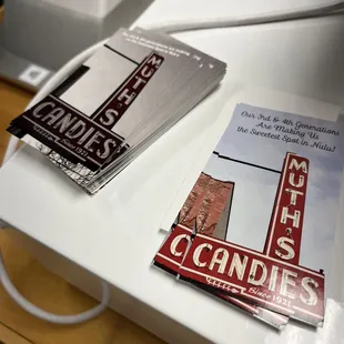 a sign and a book on a table