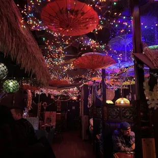 the interior of a tiki bar
