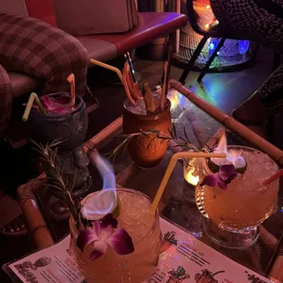 two cocktails on a table