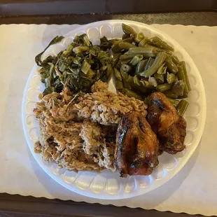 Buffet items: pulled pork, smoked chicken wings, great collards, and green beans.
