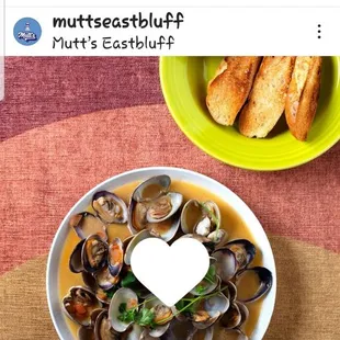 Clams at Mutts at delicious. Cher adds his own touch!