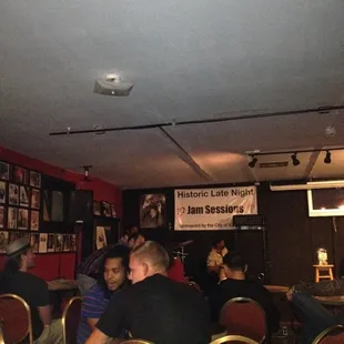 a group of people sitting at tables