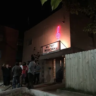 a group of people standing outside