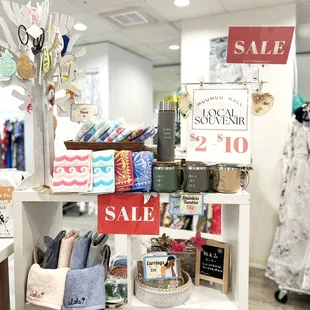 We have inexpensive Souvenir section. There are special in-store sale items, too.