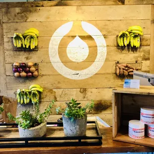 a display of bananas and other fruits