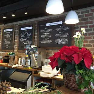 a restaurant counter with a bunch of food on it