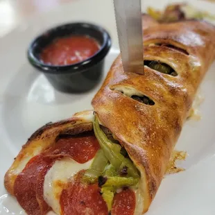 pepperoni and sausage stromboli