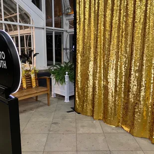 Beautiful large sequin gold backdrop. Will Rogers Gardens event.