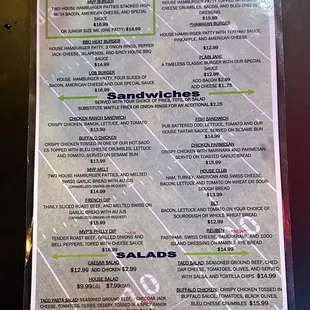 a menu for burgers and salads