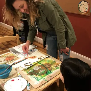 Instructor, Ms. Gwen demonstrating to a student in our 9&amp;up class at our Carmel Myart Studio.