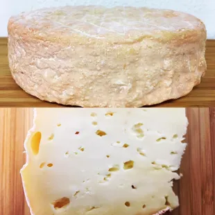 a piece of cheese on a cutting board