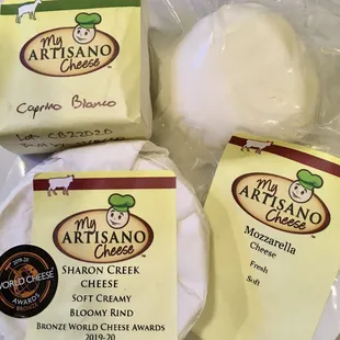 three packages of artisano cheese