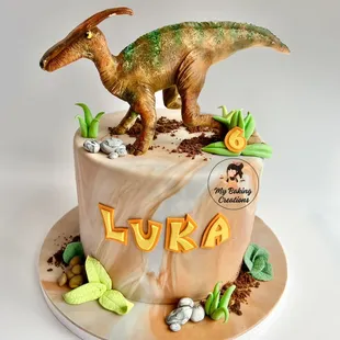 This cake features a detailed Parasaurolophus topper that brings the Jurassic era right to the party!