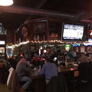 people sitting at the bar