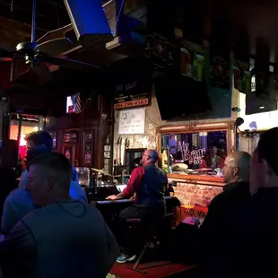people sitting at the bar