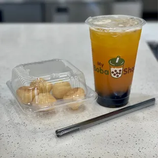 Passion Fruit Tea with mini cream puffs