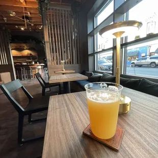 a glass of beer on a table