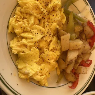 Supposed to be 4 scrambled eggs. Flavorless. Potatoes were soggy and vegetables were old.