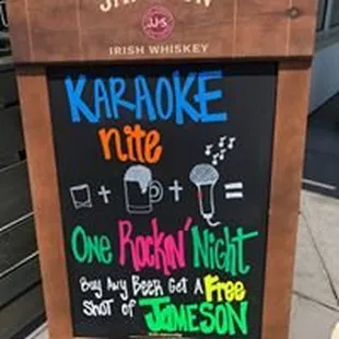 a sign for karaoke rate