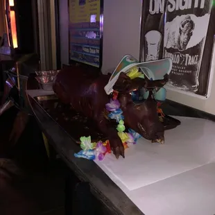 a chocolate cake with a cow on it