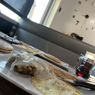 a plate of pancakes and eggs