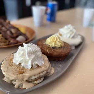 Flight of pancakes sub in malasada pancake in middle
