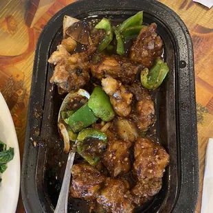 Oysters w/ black bean sauce in sizzling plate $19.95 - Jan. 01, 2022
