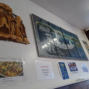 a variety of pictures on the wall