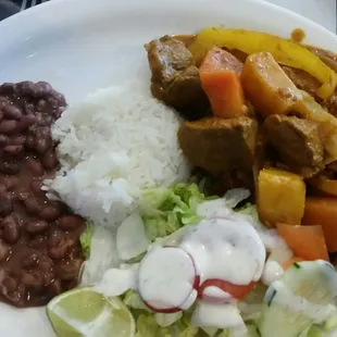 Carne guisada with rice, beans, and thick corn tortillas.  This is THE order at My Canton.