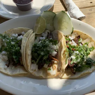 three tacos on a plate