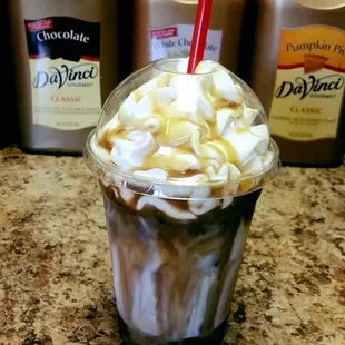 a cup of coffee with whipped cream