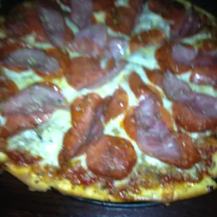 A small Meat lovers pizza