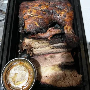 2 Meat Combo. Chicken leg quarter, brisket, and bbq sauce.