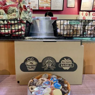 a box of muffins and a box of bagels