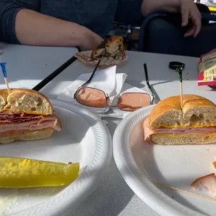 She ordered the same sandwich. The one on the left was ordered first and then she ordered mine on the right later.