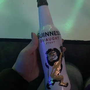 a bottle of guinness draught stout