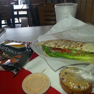 A personalized Californian/chicken salad Pita w/chips, chocolate chip cookies and an Arnold Palmer