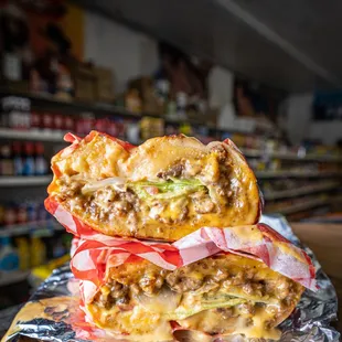 a cheeseburger stacked on top of each other