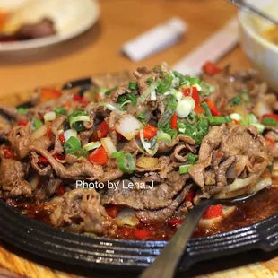 Amazing Sizzling Cumin Lamb 坡子街铁板孜然羊 ($25.95)