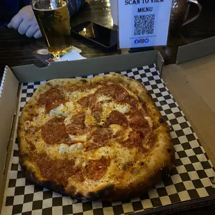 a pizza in a box on a table