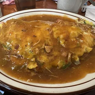 Supreme Omelet smothered with tasty green chili!